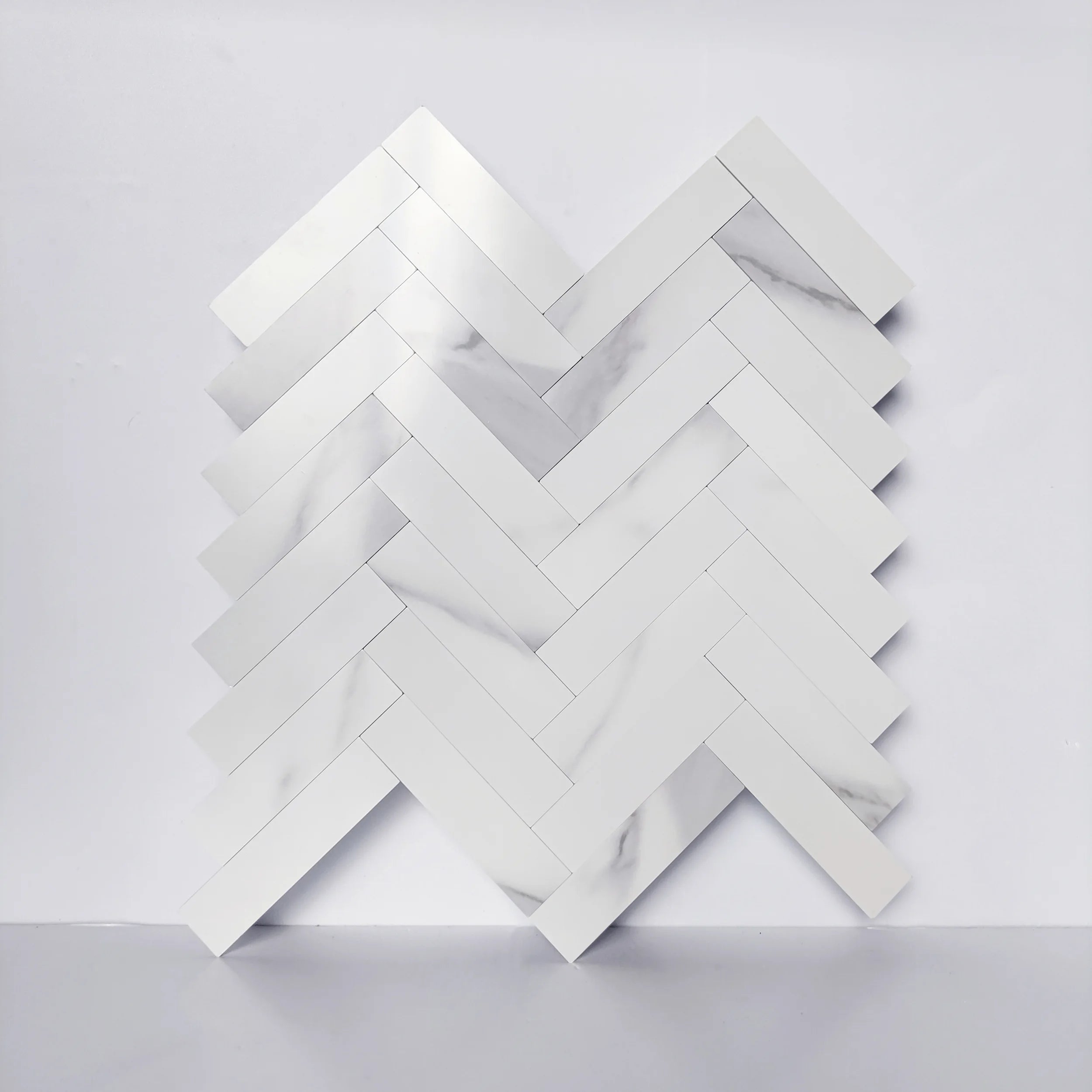 COLAMO Thick Carrara White Herringbone Peel and Stick Backsplash Marble Look Tiles