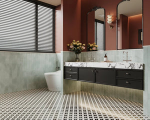 Modern spa-style bathroom featuring Colamo Cloud Gray subway peel and stick tiles, waterproof vertical stacked wall decor paired with bold terracotta walls.