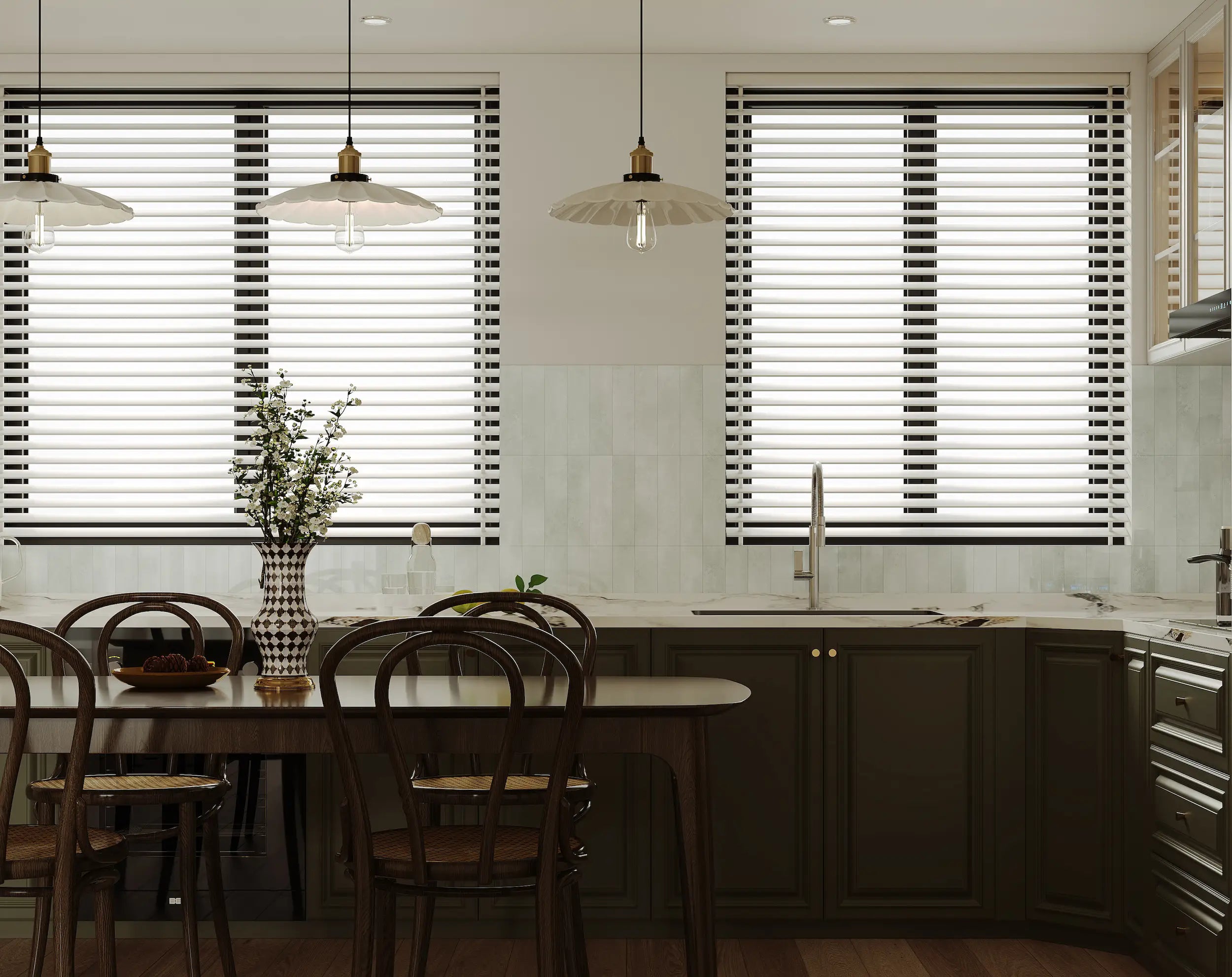 Modern kitchen with Colamo Cumulus White subway tiles in a vertical stacked pattern, creating a soft off-white backsplash under natural window light.