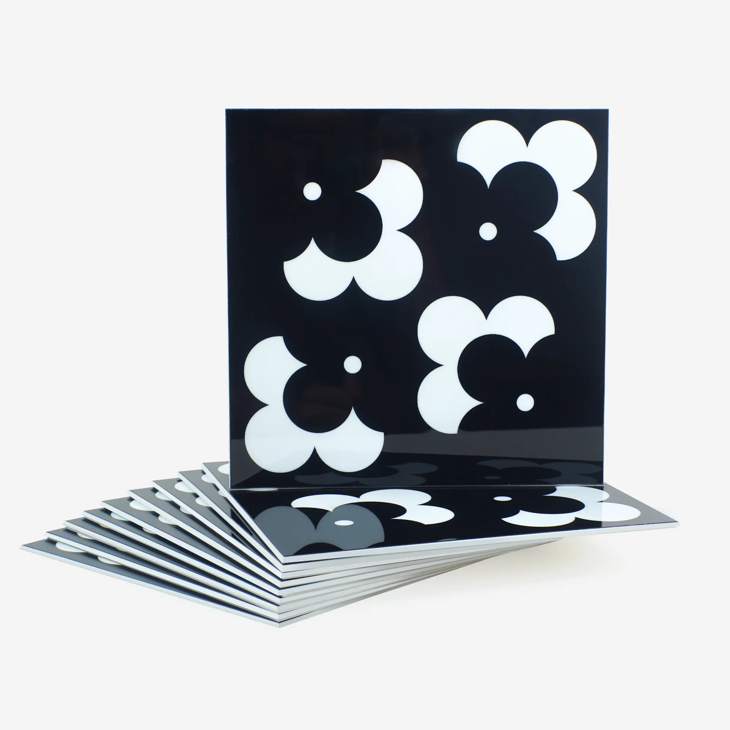 Colamo premium glossy black and white floral pattern peel and stick backsplash tile, bold modern flower design for wall decor