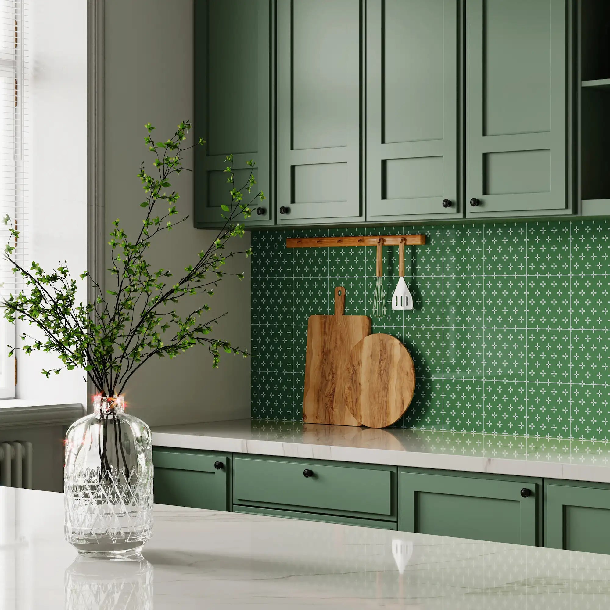 Modern kitchen interior featuring Colamo green graphic patterned wall tiles, showcasing an easy and luxury DIY backsplash renovation.