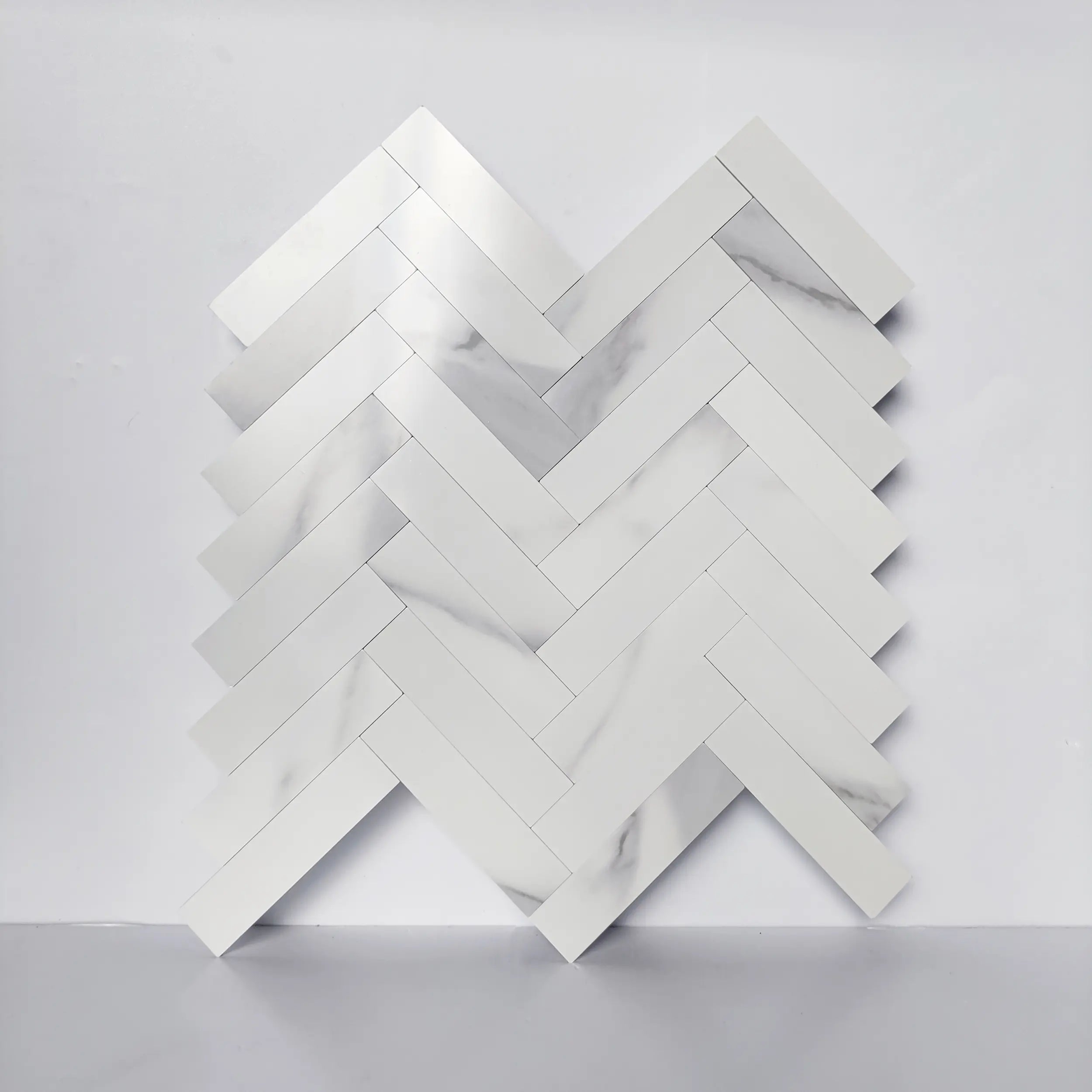 COLAMO Thick Carrara White Herringbone Peel and Stick Backsplash Marble Look Tiles