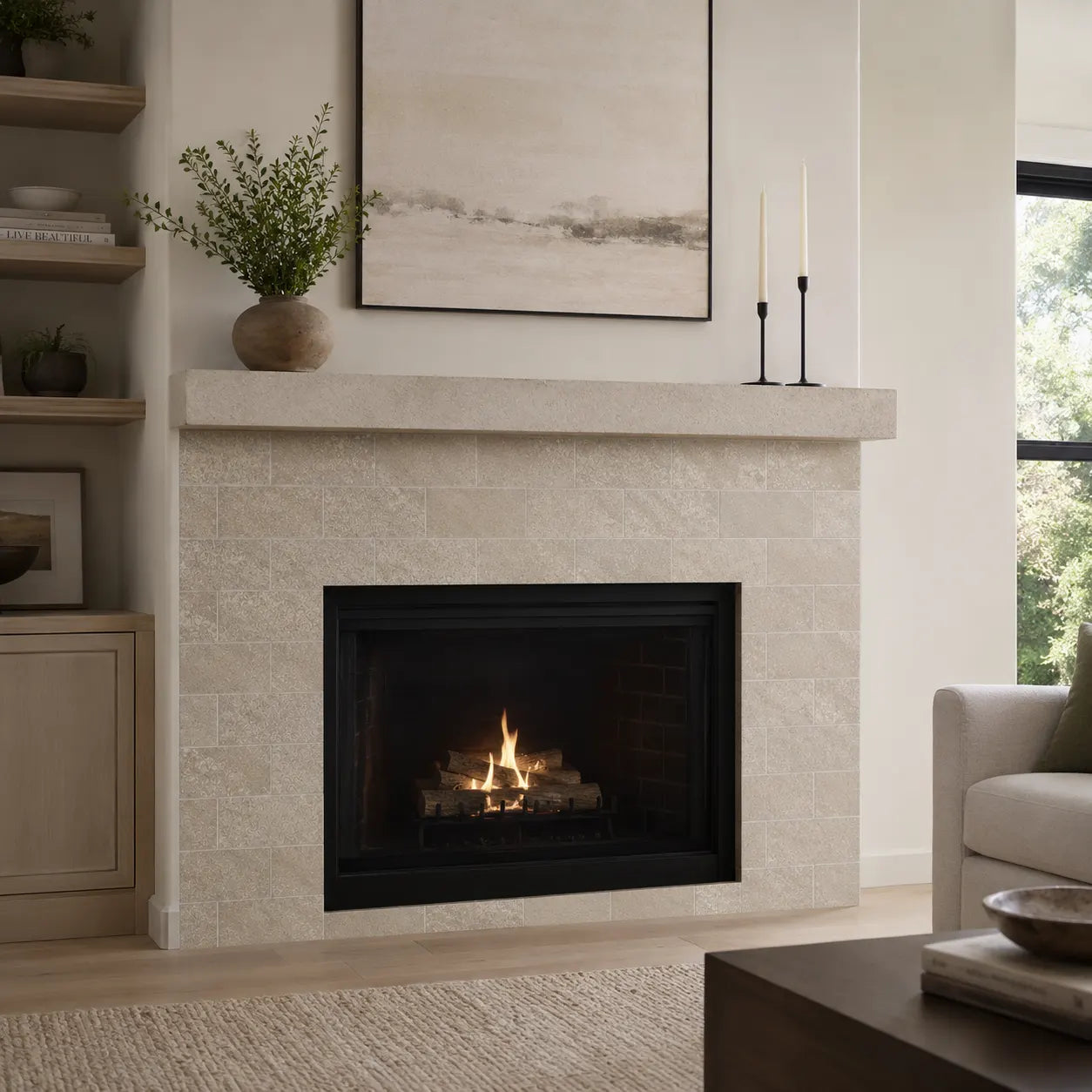 Beige travertine subway peel and stick backsplash tile around a modern living room fireplace with neutral decor and wood accents