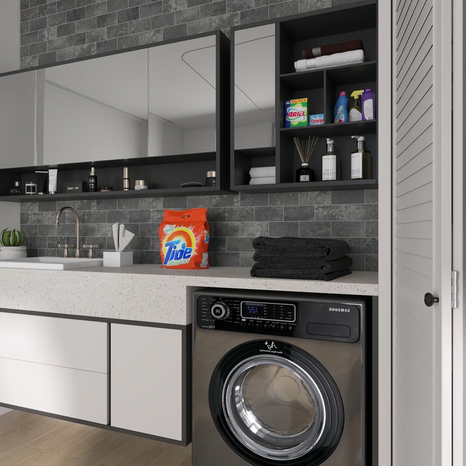 Charcoal gray stone peel and stick tiles installed as a laundry room backsplash.