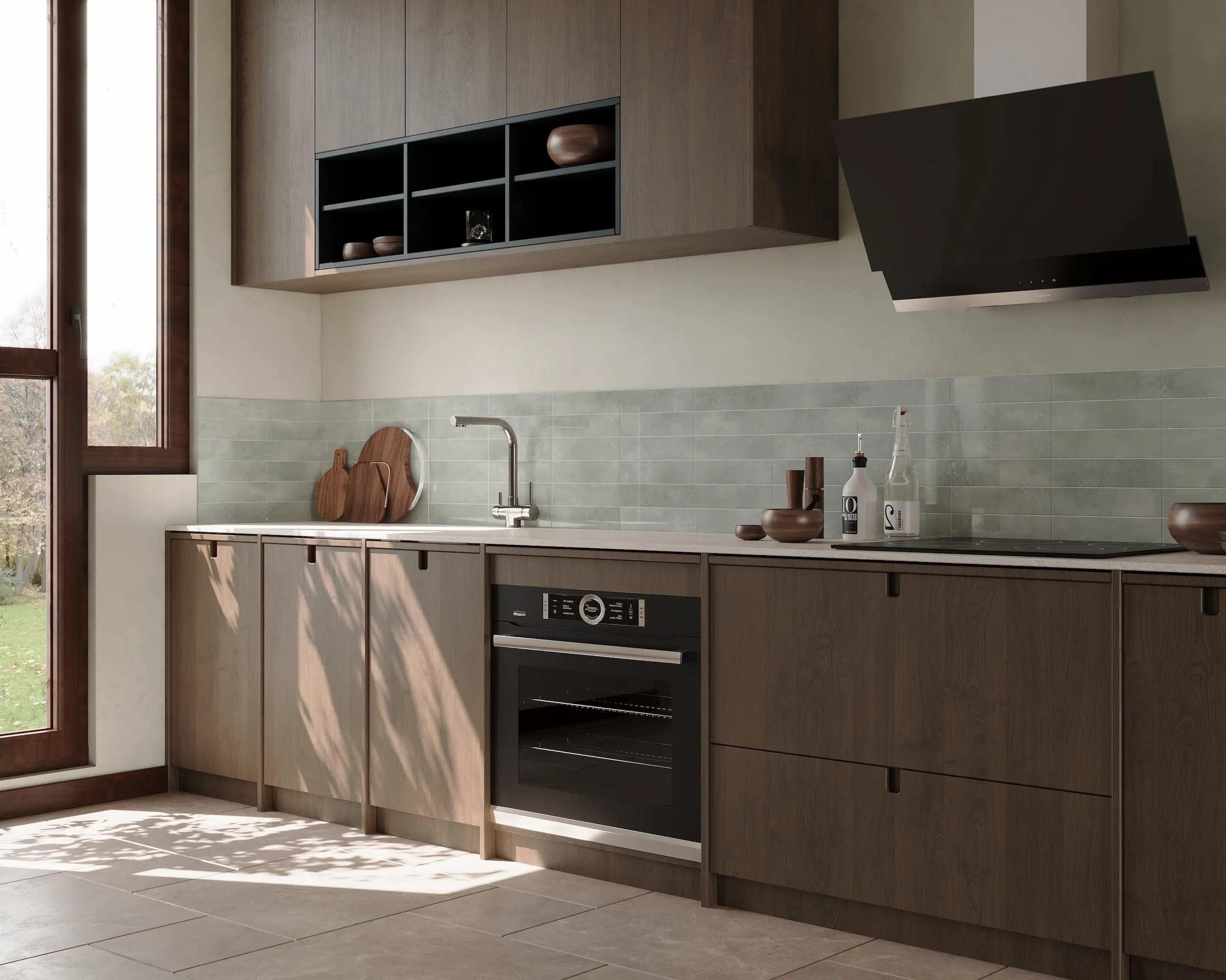 Spacious modern kitchen featuring Colamo Cloud Gray subway peel and stick tiles, soft gray backsplash paired with dark wood cabinetry and natural sunlight.