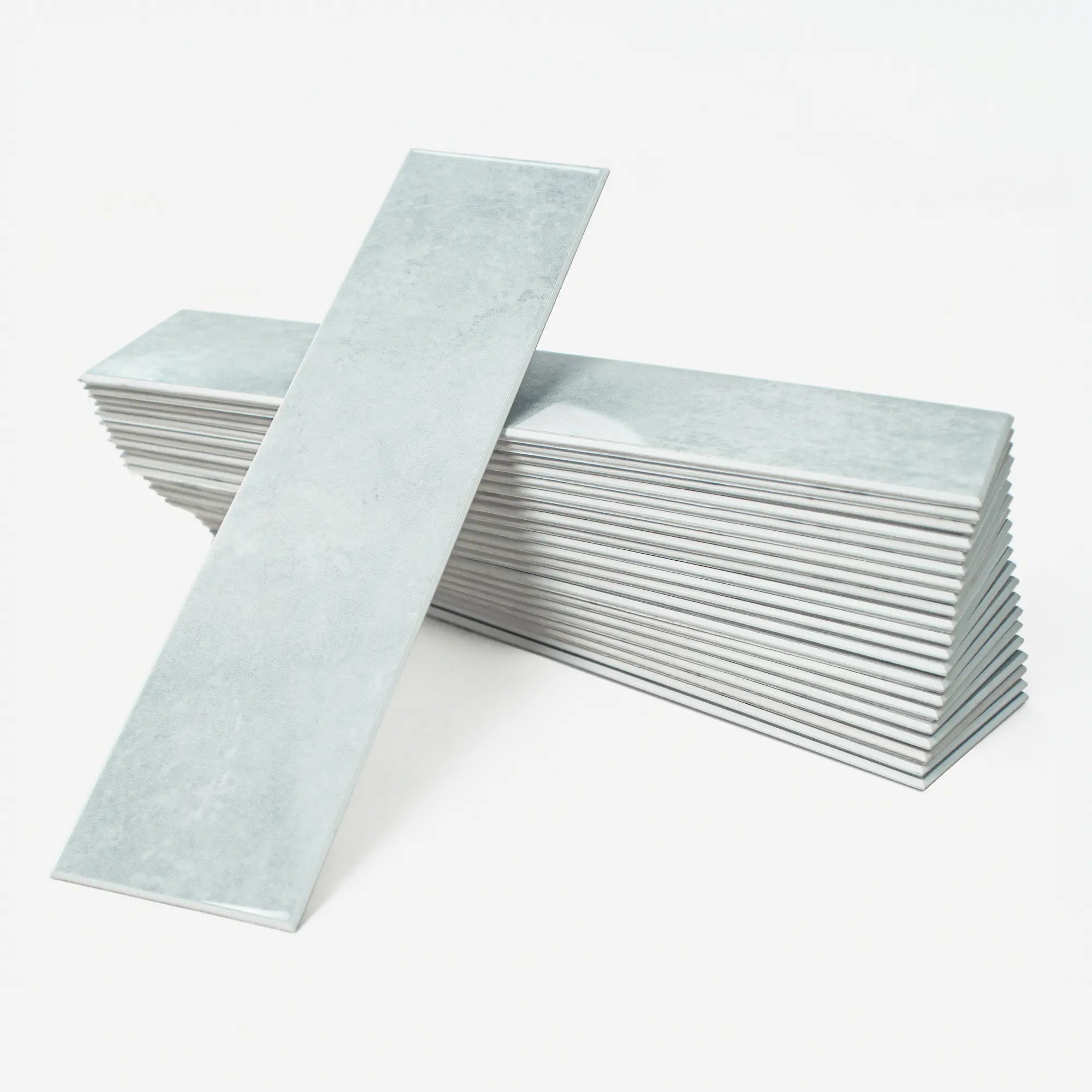 Colamo premium glossy Cloud Gray subway peel and stick tile, modern light gray rectangular wall tile for sophisticated DIY kitchen or bathroom decor