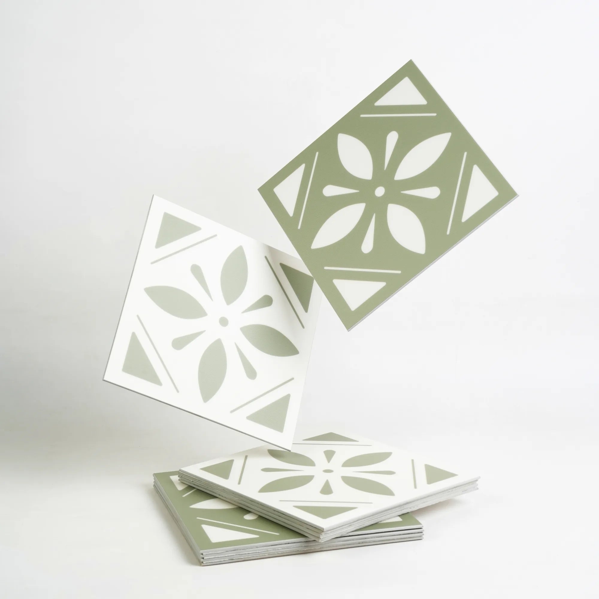 Sage green floral peel and stick backsplash tile with white vintage pattern